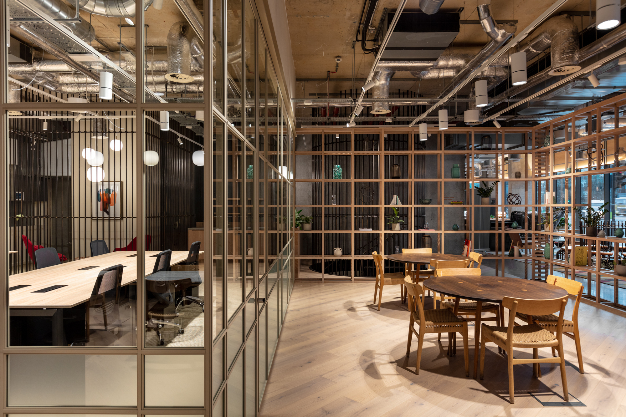 Unique lighting and plant-filled dividers in the FORA Borough Market office designed by Two.