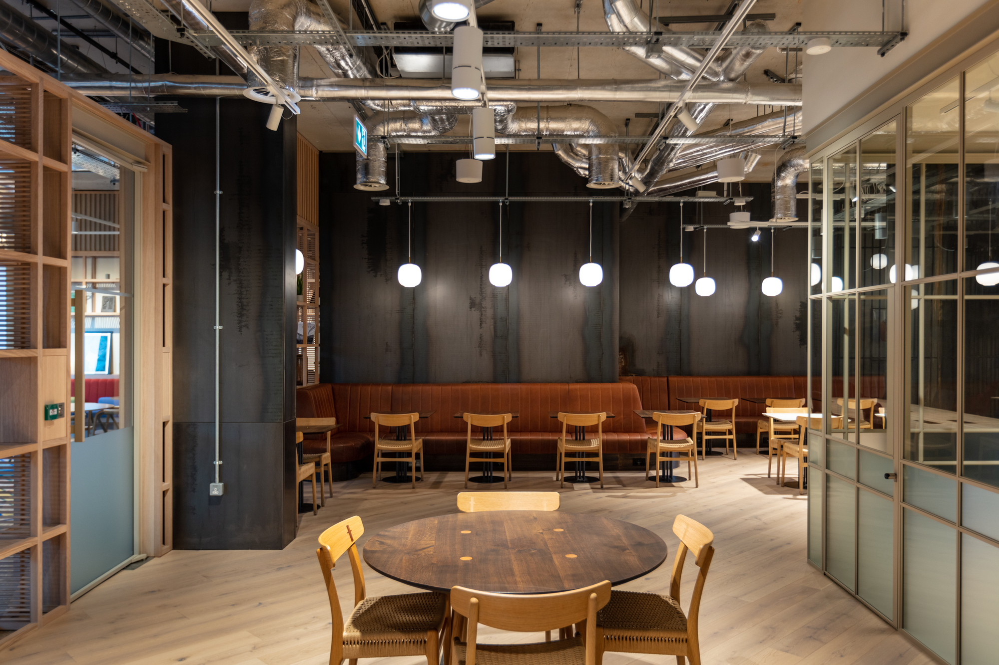 FORA Borough Market office lounge by Two, combining industrial design with soft furnishings.