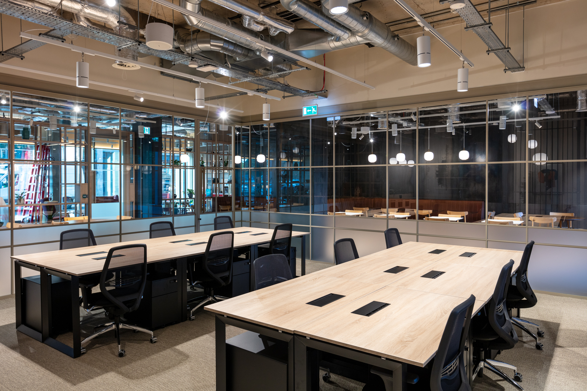 Shared workspace with modern desks and ergonomic chairs in the FORA Borough Market office, designed by Two